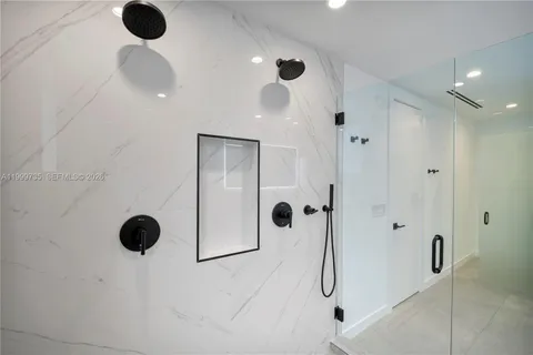 a bathroom with a bathtub and sink