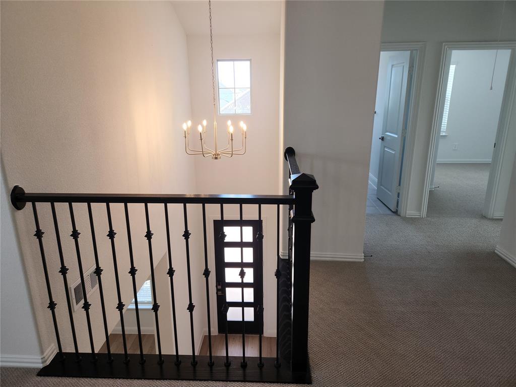 2433 Glacier Ridge Corinth, TX 76210 - Photo 31 of 40 a view of a porch with a door