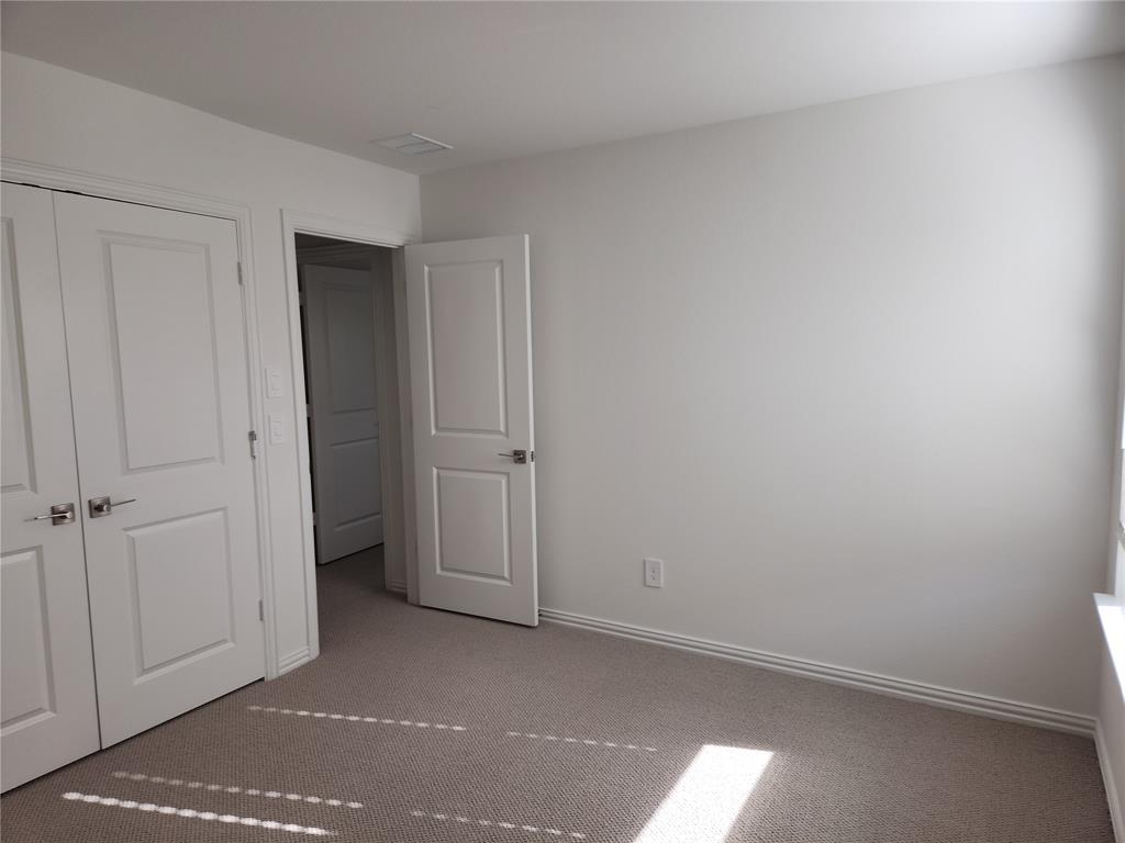 2433 Glacier Ridge Corinth, TX 76210 - Photo 34 of 40 a view of an empty room