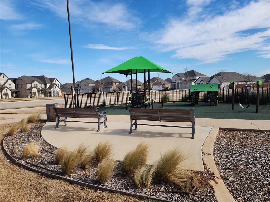 2433 Glacier Ridge Corinth, TX 76210 - Photo 38 of 40 a outdoor space with lots of trees