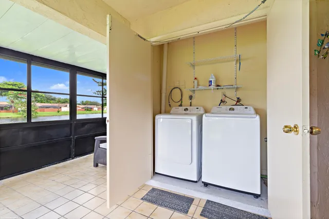 a utility room with dryer and washer