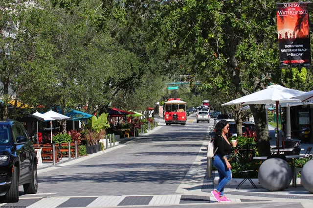 a view of street with sitting area