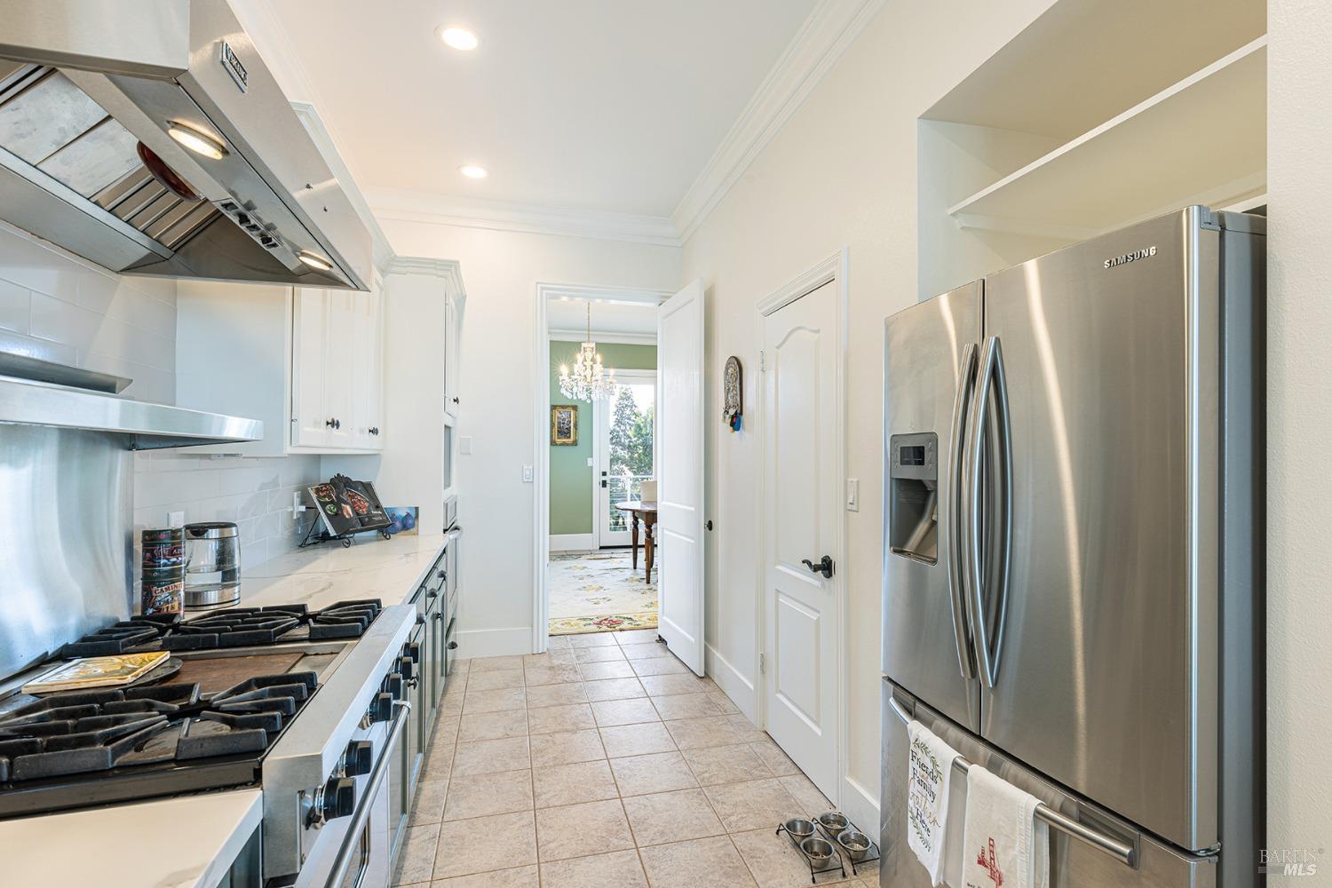 1730 Milton Road Napa, CA 94559 - Photo 27 of 77 a kitchen with stainless steel appliances granite countertop a refrigerator and a stove