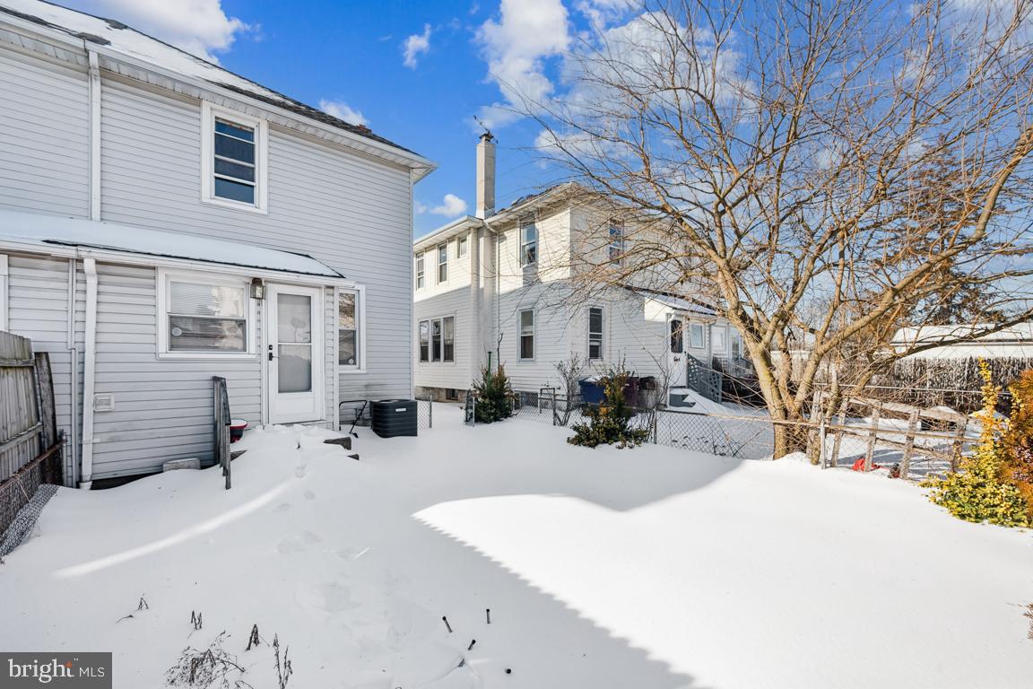 525 Bridgeboro Street Riverside, NJ 08075 - Photo 14 of 16 a view of a house with snow on the road
