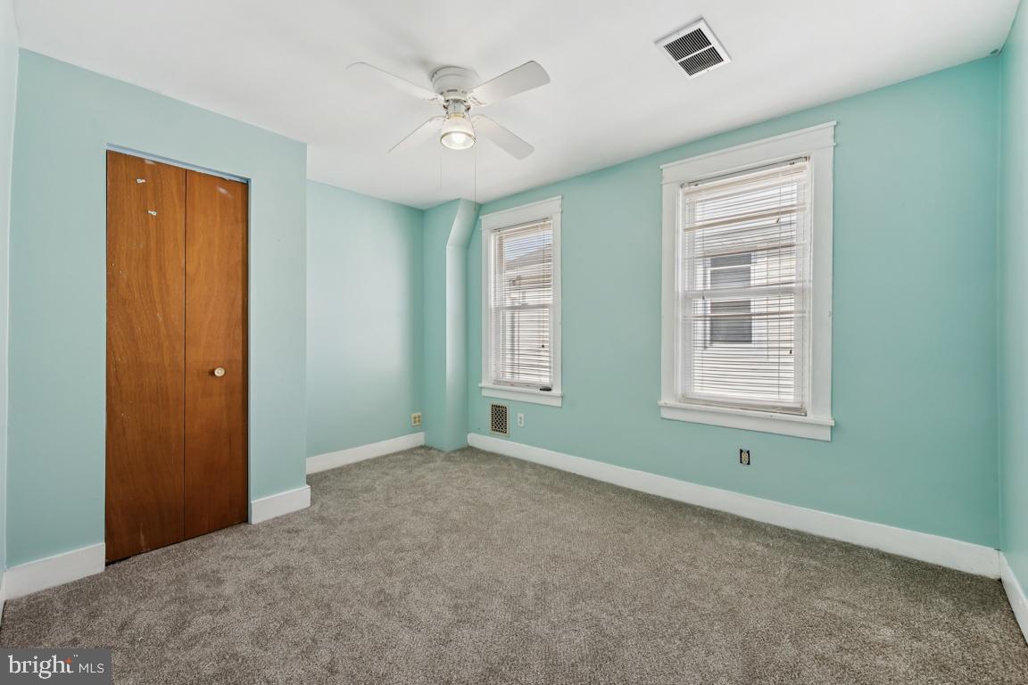 525 Bridgeboro Street Riverside, NJ 08075 - Photo 9 of 16 a view of an empty room with a window