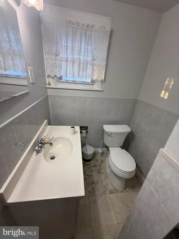 a view of a room with wooden walls