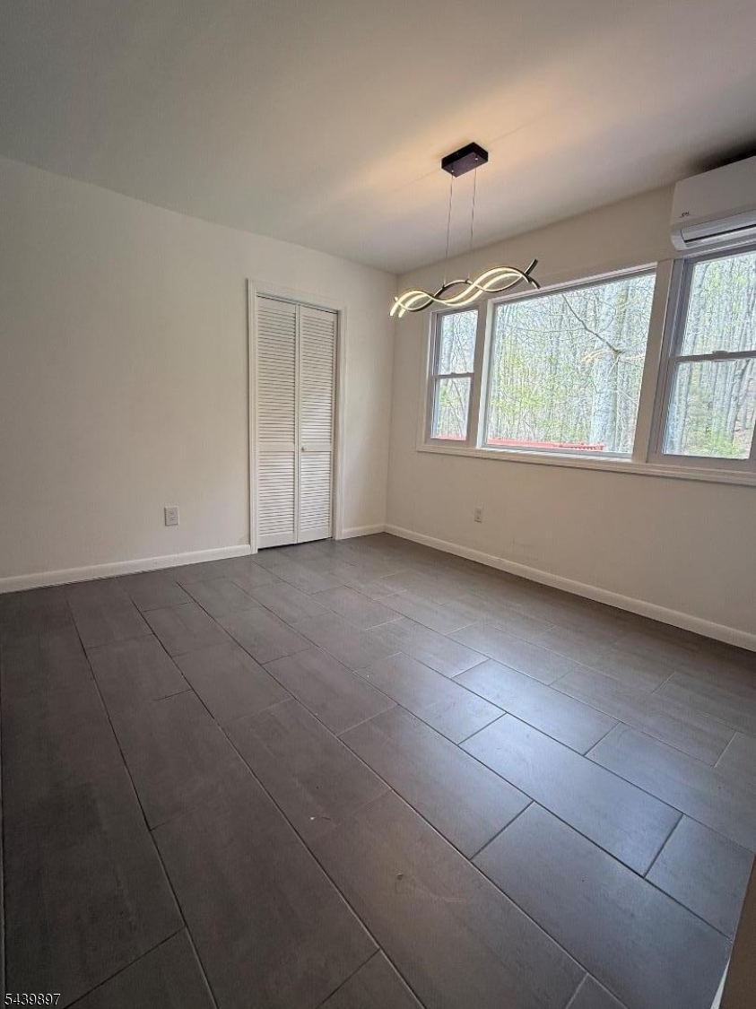 22 Karen Road Vernon, NJ 07422 - Photo 12 of 26 an empty room with windows and closet