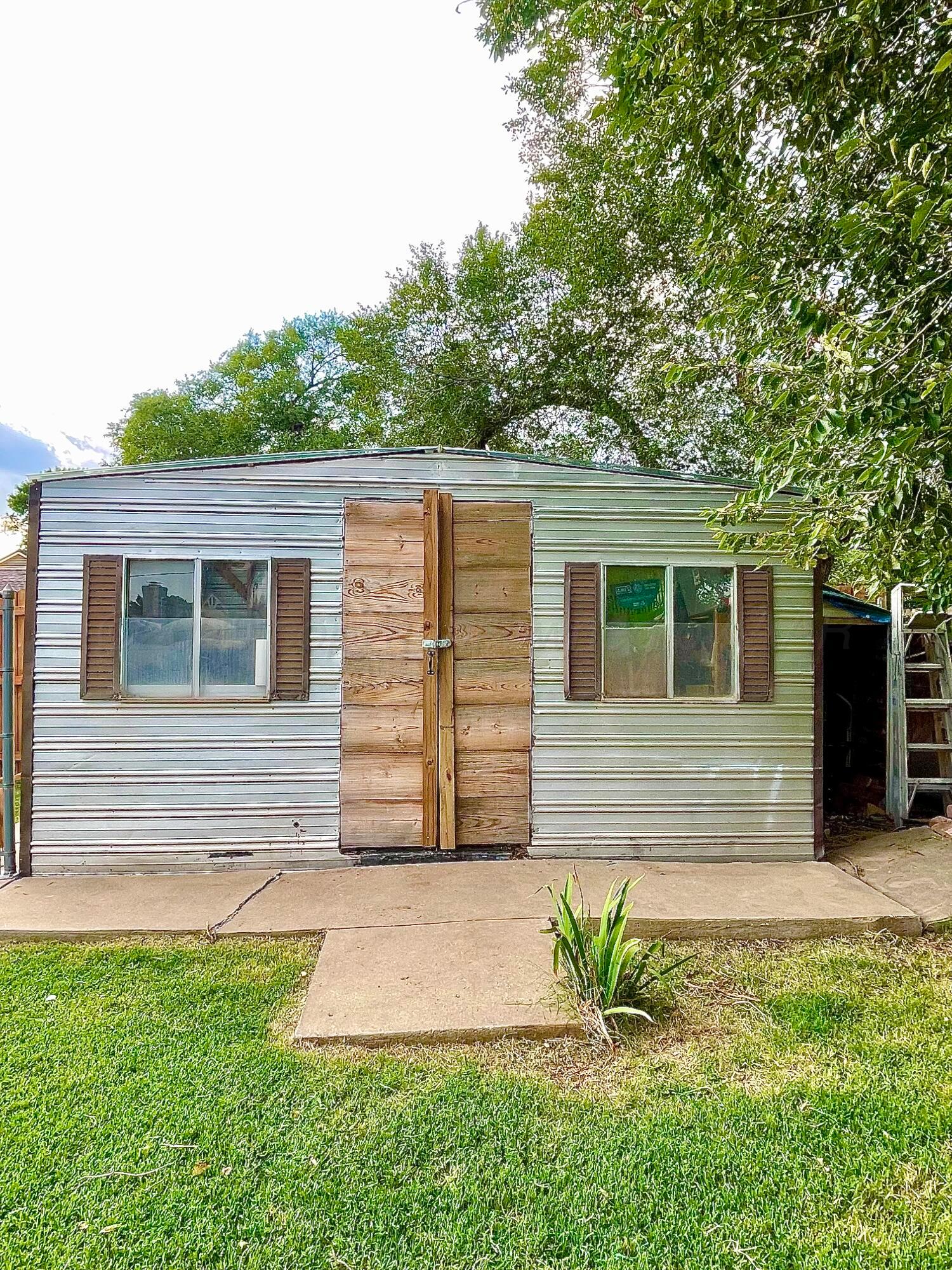 2406 Juniper Drive Amarillo, TX 79109 - Photo 24 of 28 a view of house with backyard