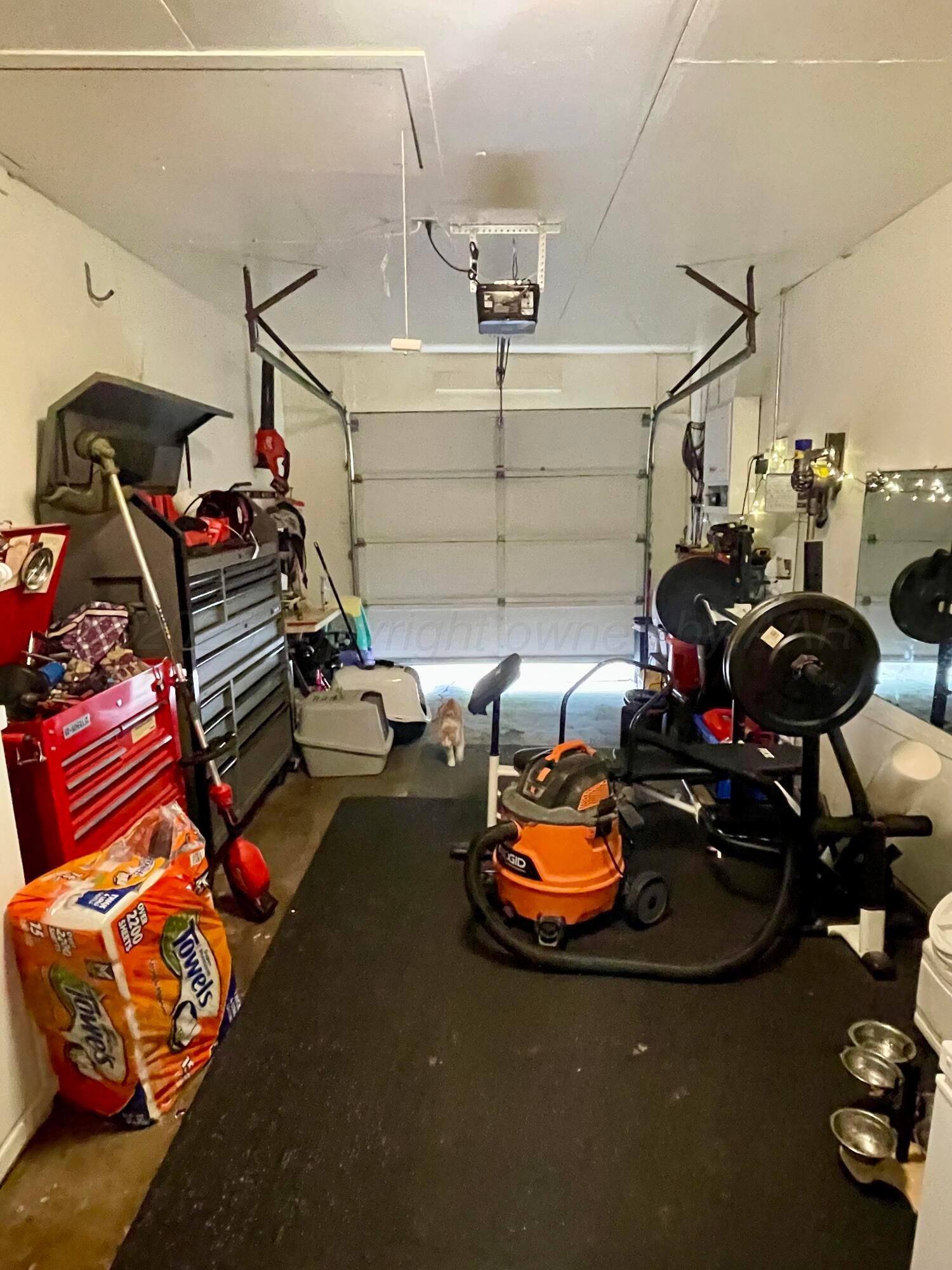 2406 Juniper Drive Amarillo, TX 79109 - Photo 28 of 28 a view of a garage with stuff