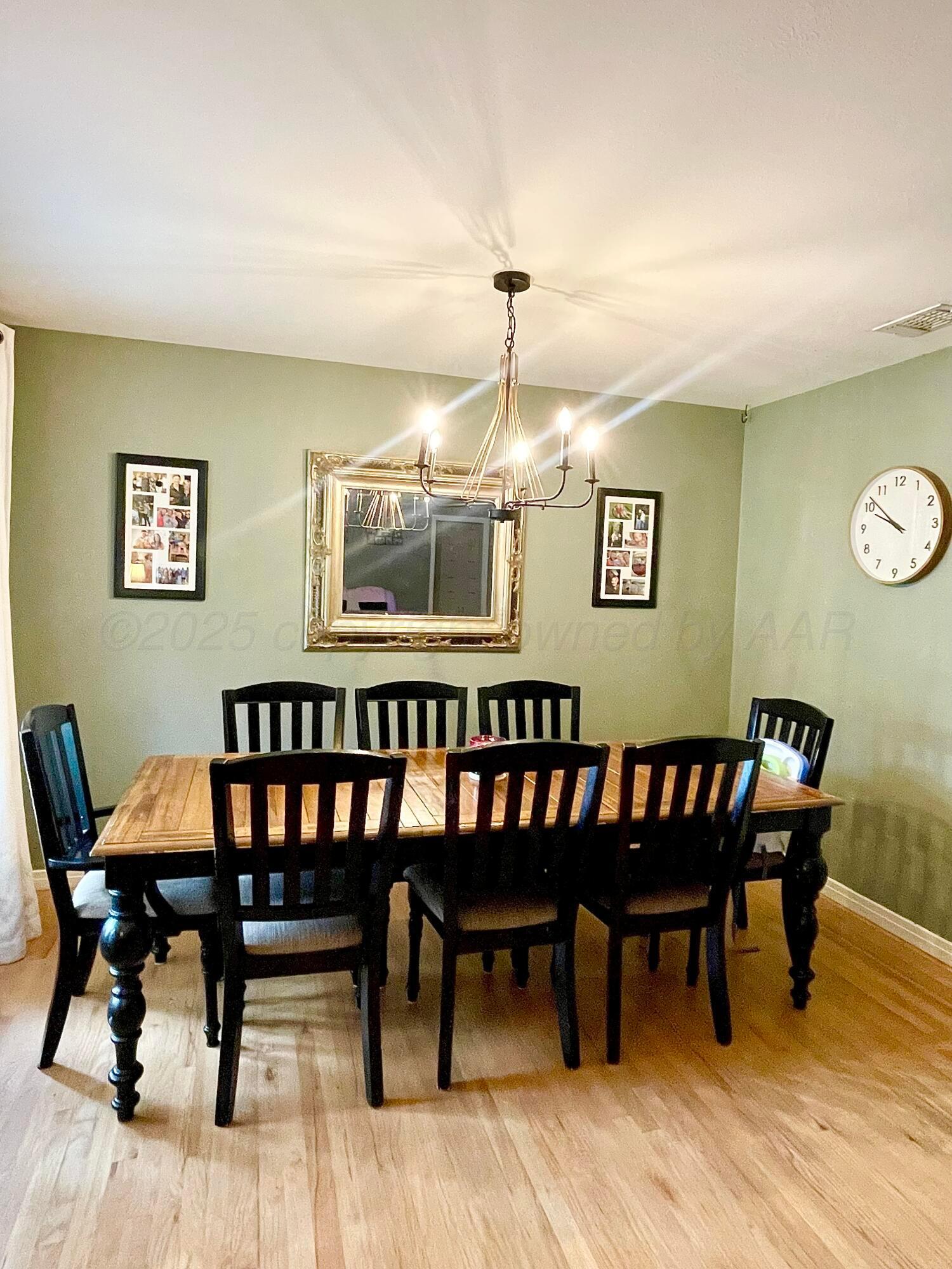 2406 Juniper Drive Amarillo, TX 79109 - Photo 8 of 28 a view of a dining room with furniture and wooden floor
