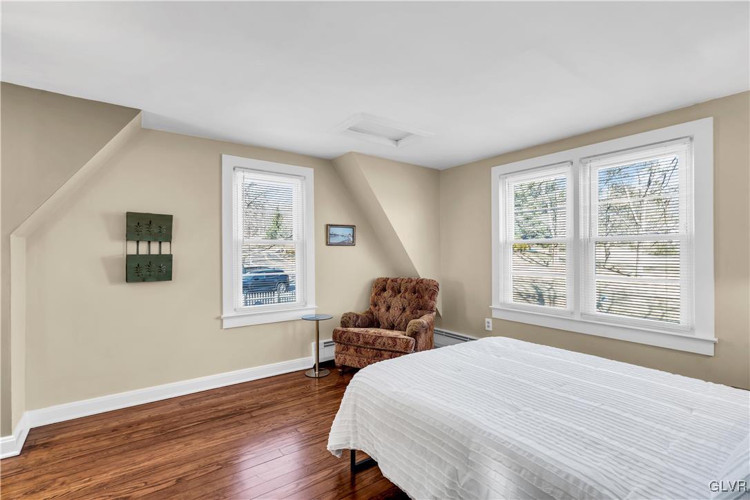 975 State Park Road Wind Gap, PA 18091 - Photo 11 of 17 a bedroom with a bed and wooden floor