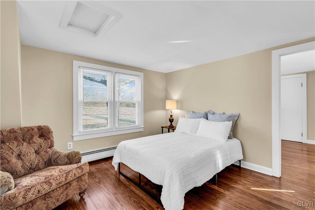 975 State Park Road Wind Gap, PA 18091 - Photo 10 of 17 a bedroom with bed couch and window