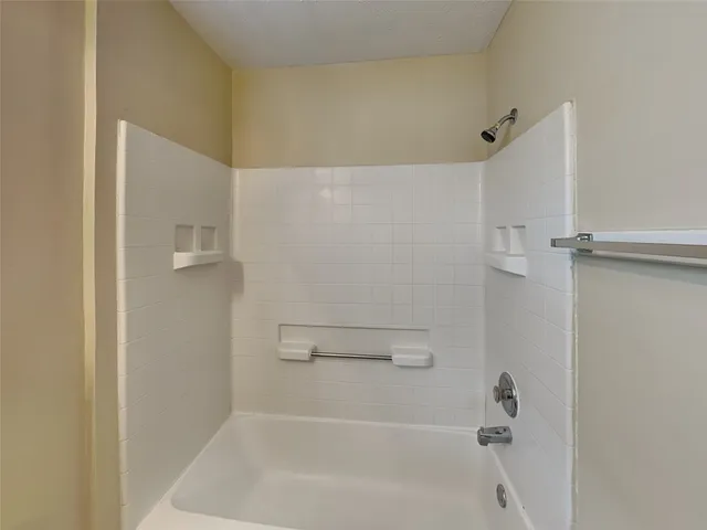 a bathroom with a bathtub