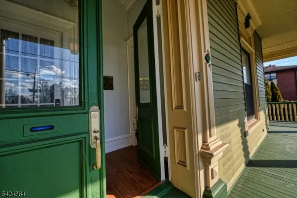a view of a balcony and door