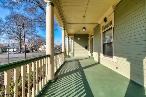 a view of balcony with a potted plant