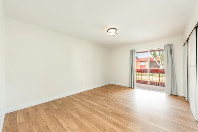 a view of a green field with clear sky