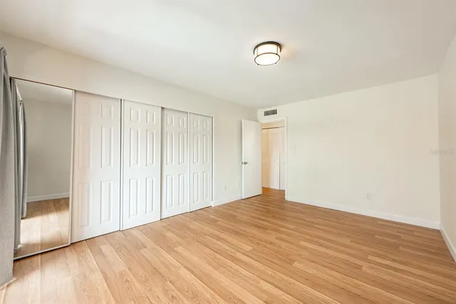 an aerial view of a house with a swimming pool yard and outdoor seating