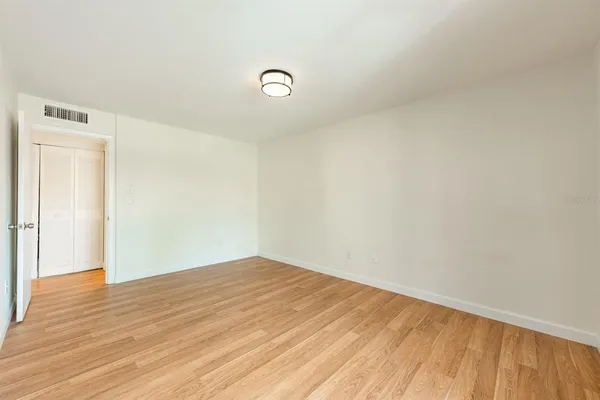 an empty room with sliding door