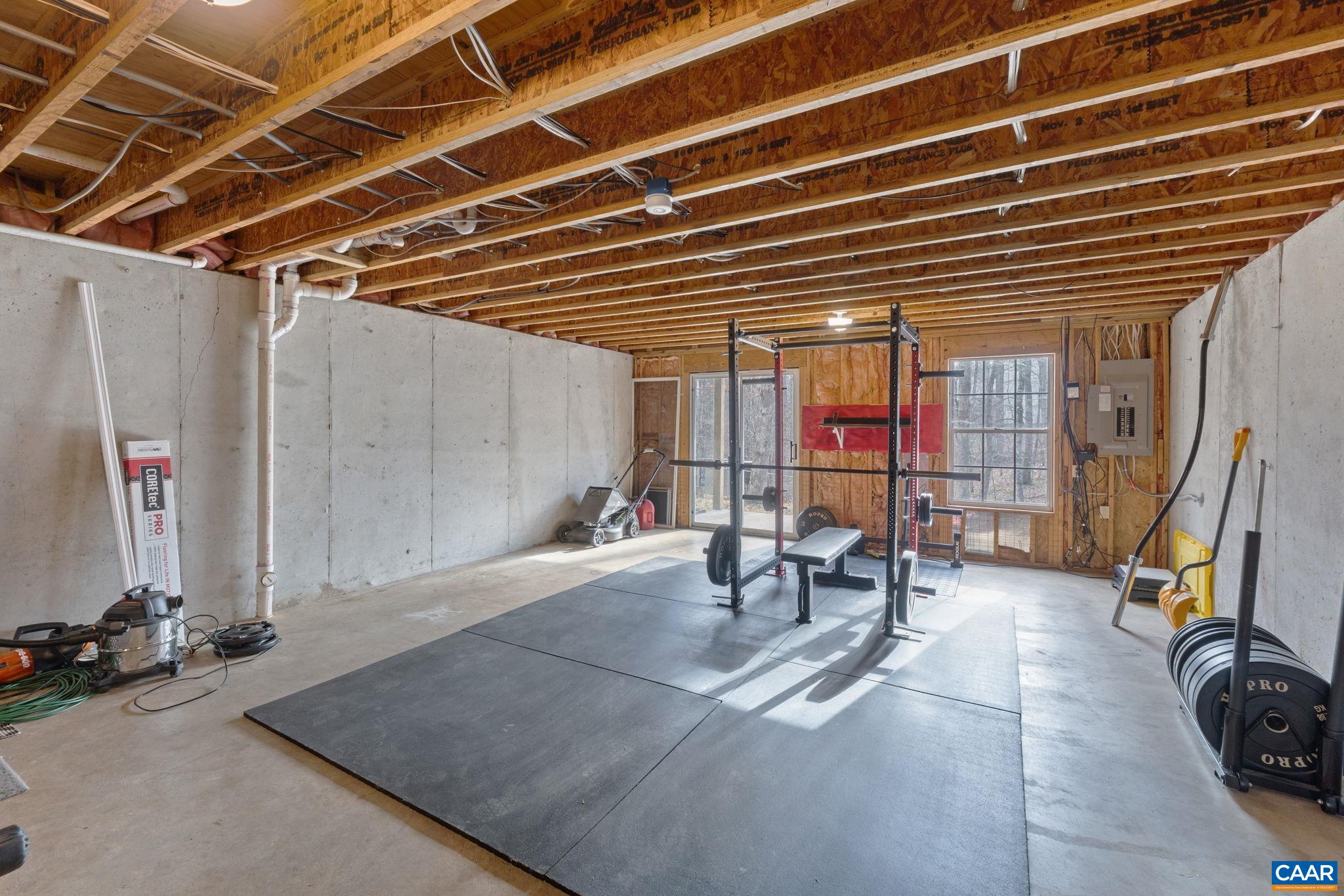 473 Larkspur Road Ruckersville, VA 22968 - Photo 18 of 28 a view of a room with gym equipment