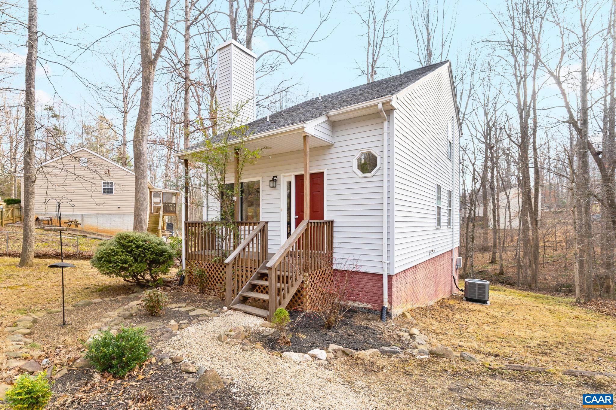 473 Larkspur Road Ruckersville, VA 22968 - Photo 22 of 28 a view of a house with a yard
