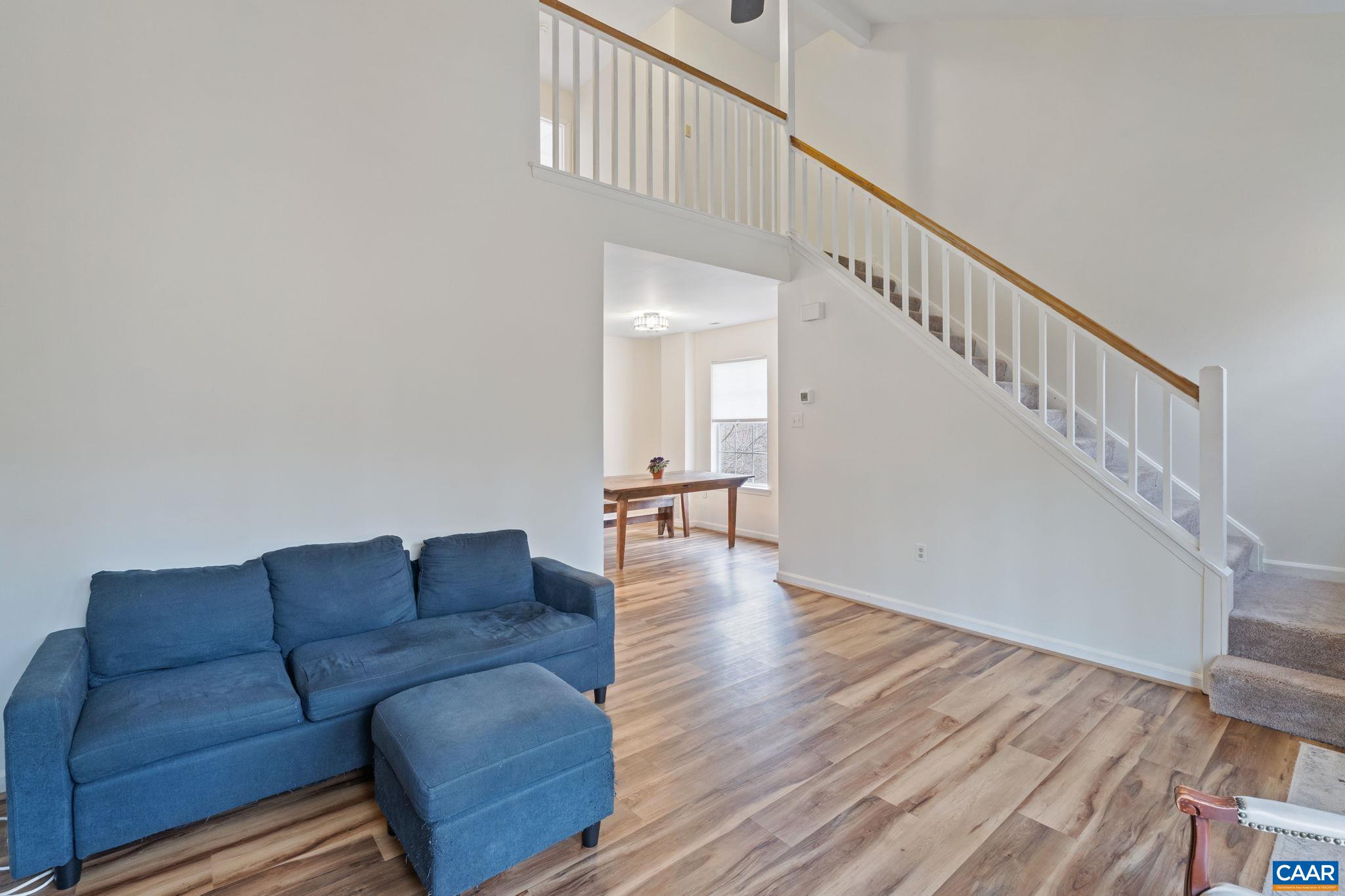 473 Larkspur Road Ruckersville, VA 22968 - Photo 5 of 28 a living room with furniture and a wooden floor