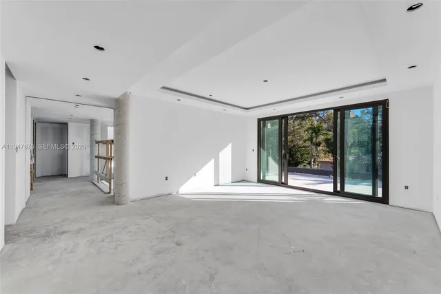 a view of a house with a tree