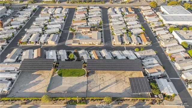 a view of swimming pool with outdoor seating