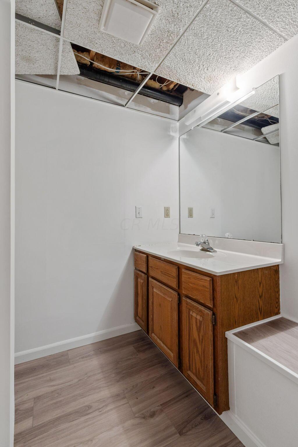 8945 Cheshire Road Sunbury, OH 43074 - Photo 45 of 56 Downstairs Bathroom