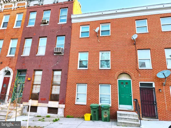 a front view of a multi story residential apartment building