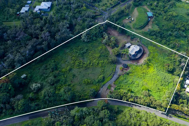 a view of a balcony with wooden floor