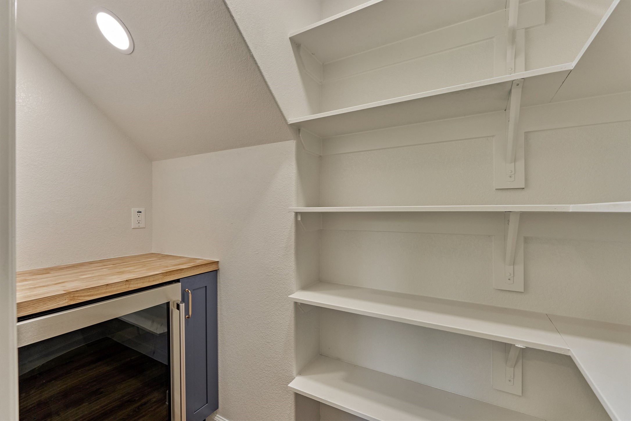 6107 Jadecrest Court Spring, TX 77389 - Photo 17 of 40 large walk in pantry with wine fridge!