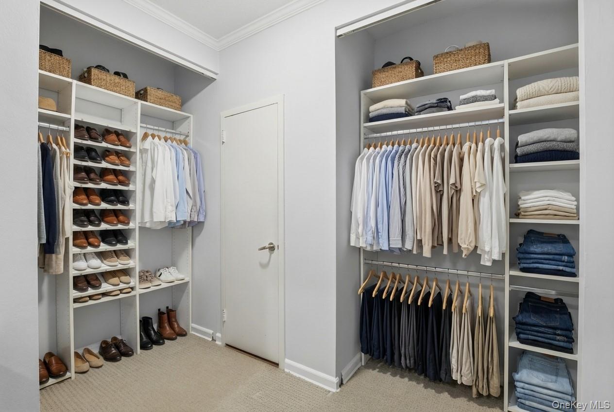 16 Rockledge Avenue, Unit 2C1 Ossining, NY 10562 - Photo 17 of 48 a view of walk in closet with clothes and shoes