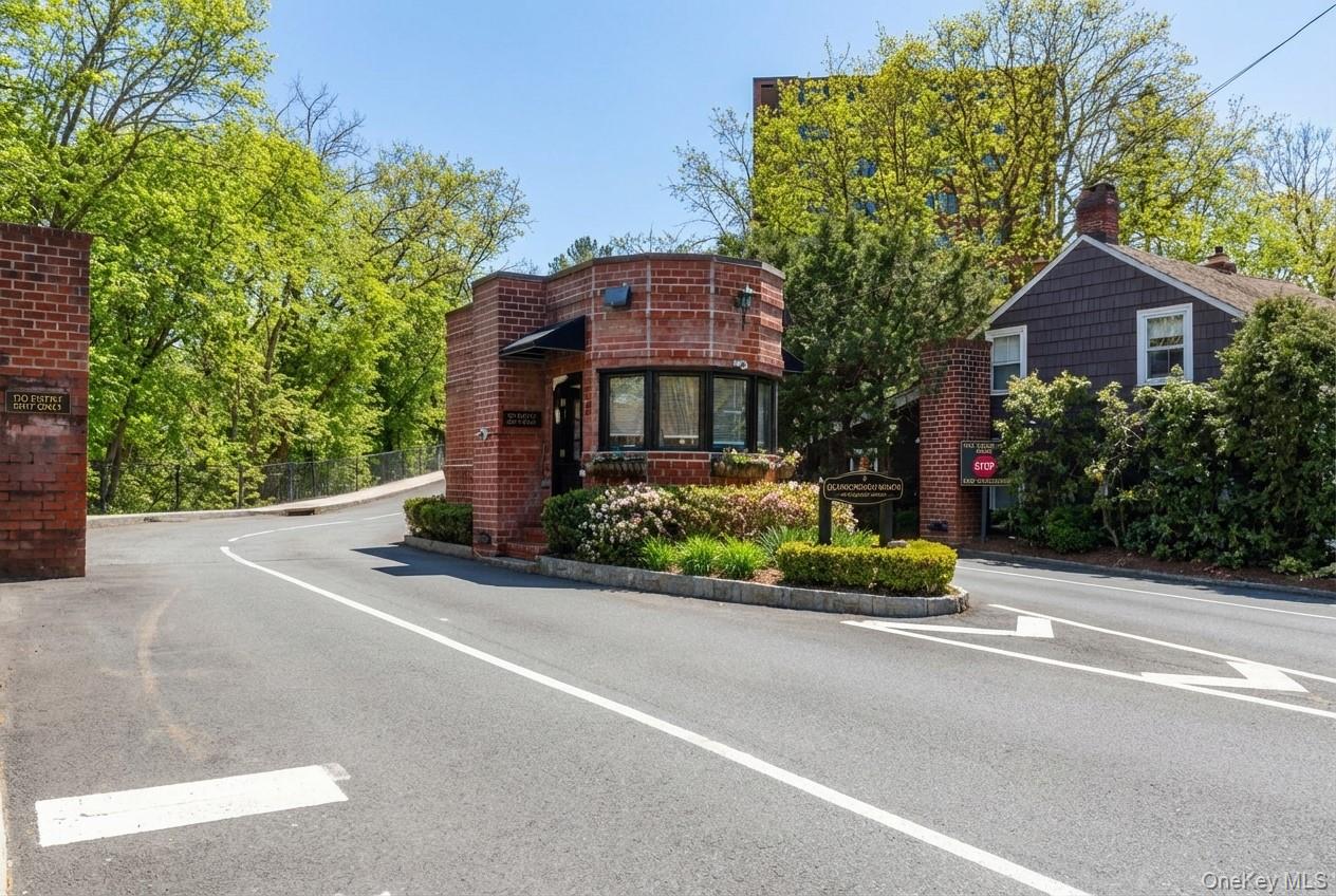 16 Rockledge Avenue, Unit 2C1 Ossining, NY 10562 - Photo 2 of 48 a front view of a house with a garden and plants