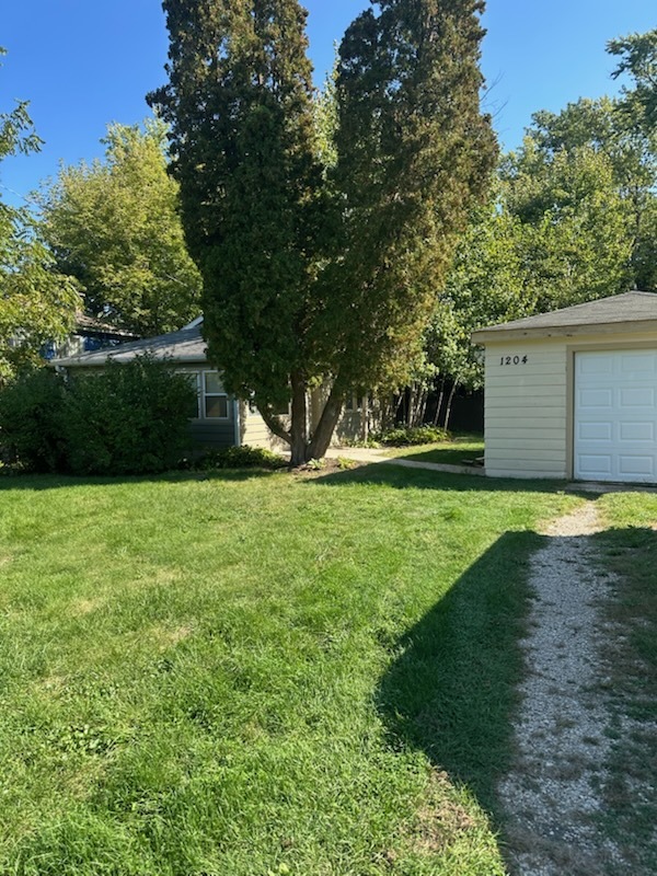 1204 North Hickory Terrace Round Lake Beach, IL 60073 - Photo 1 of 6 a view of a backyard