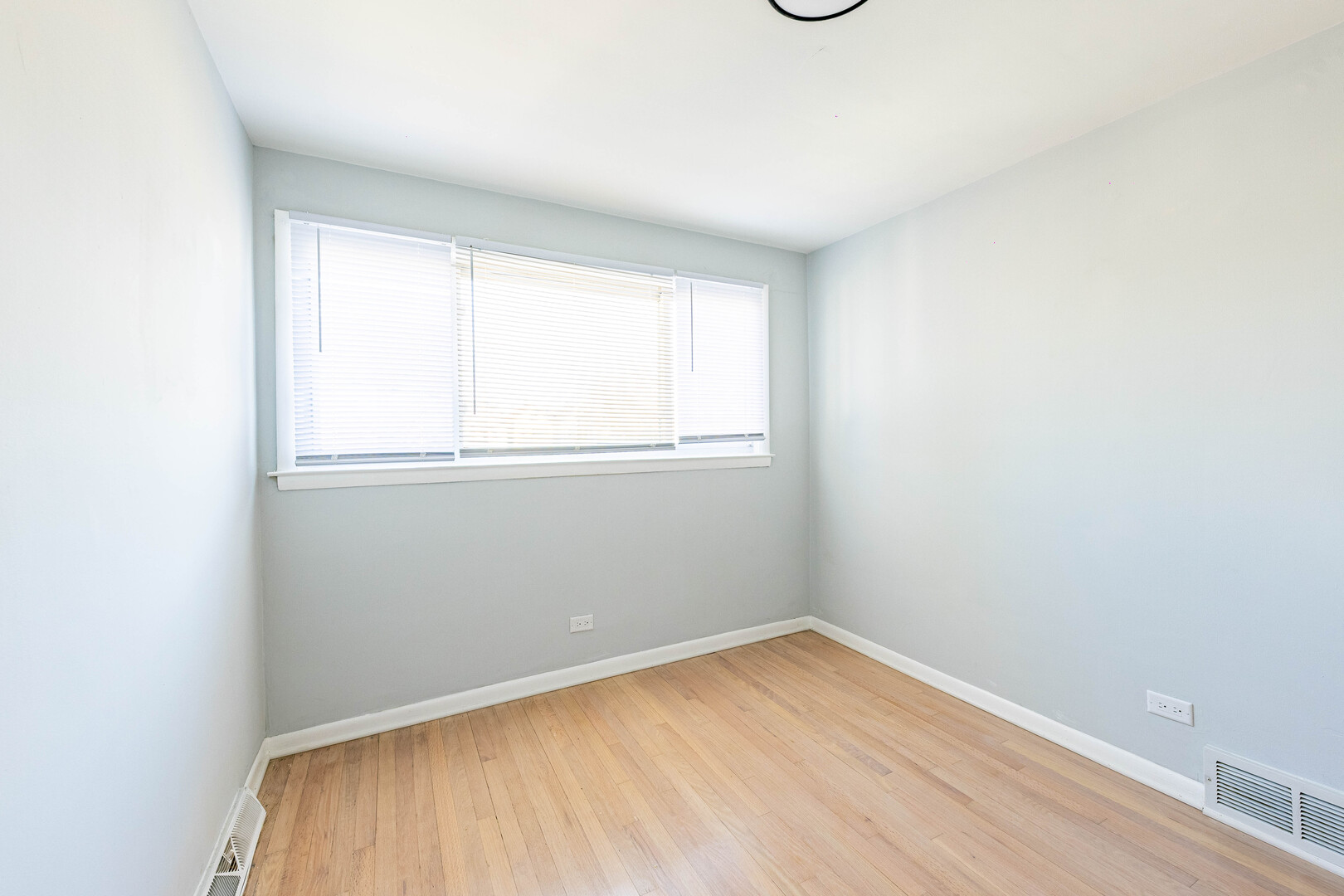 4914 West 32nd Place, Unit 2 Cicero, IL 60804 - Photo 15 of 26 an empty room with a window