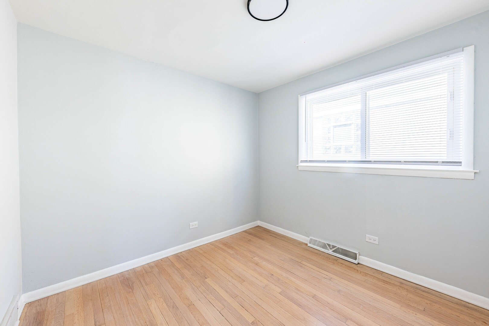 4914 West 32nd Place, Unit 2 Cicero, IL 60804 - Photo 17 of 26 an empty room with a window