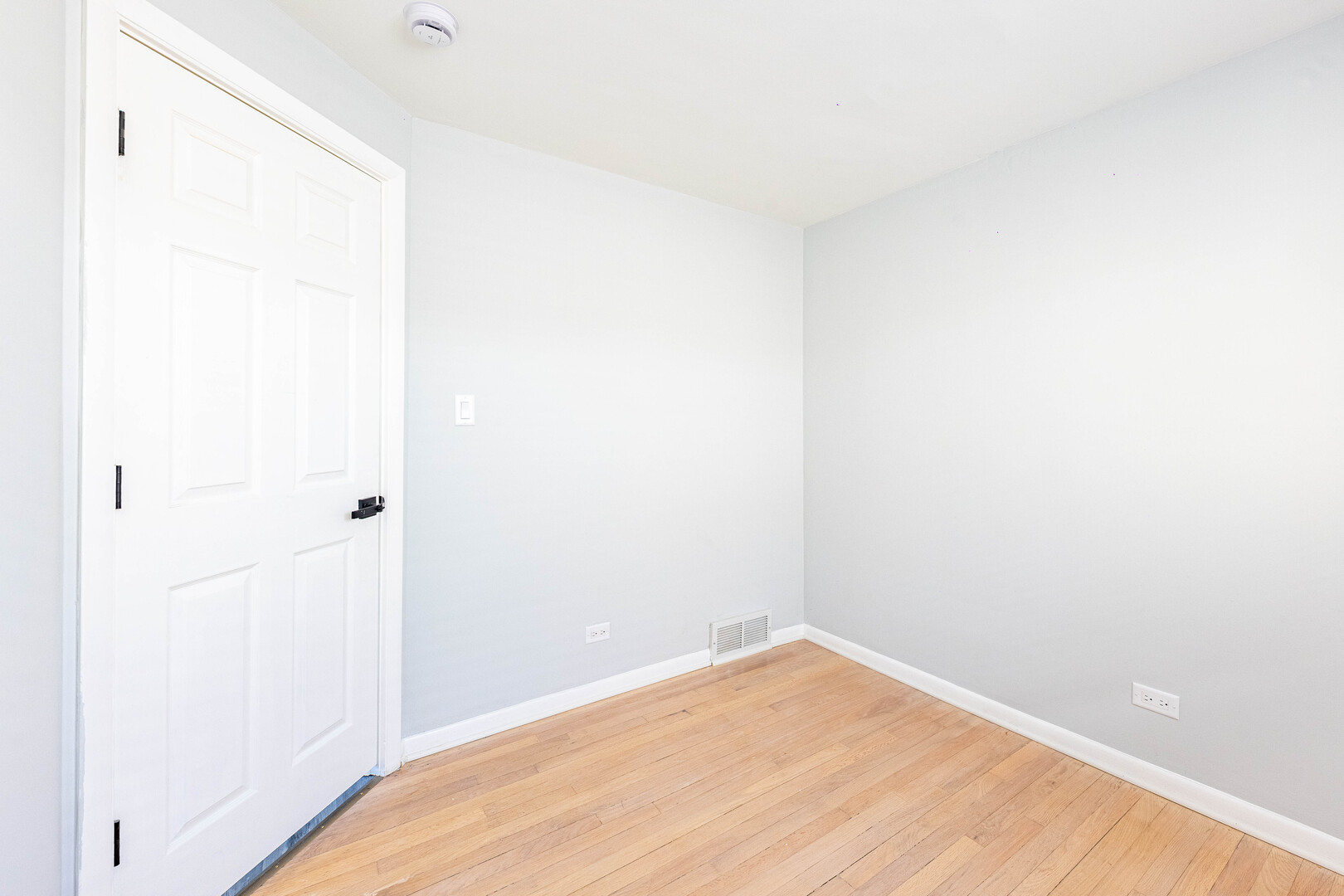 4914 West 32nd Place, Unit 2 Cicero, IL 60804 - Photo 19 of 26 a view of a room with wooden floor