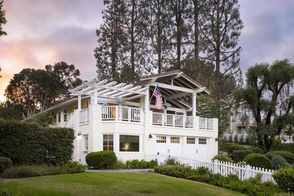 a view of a building with a yard