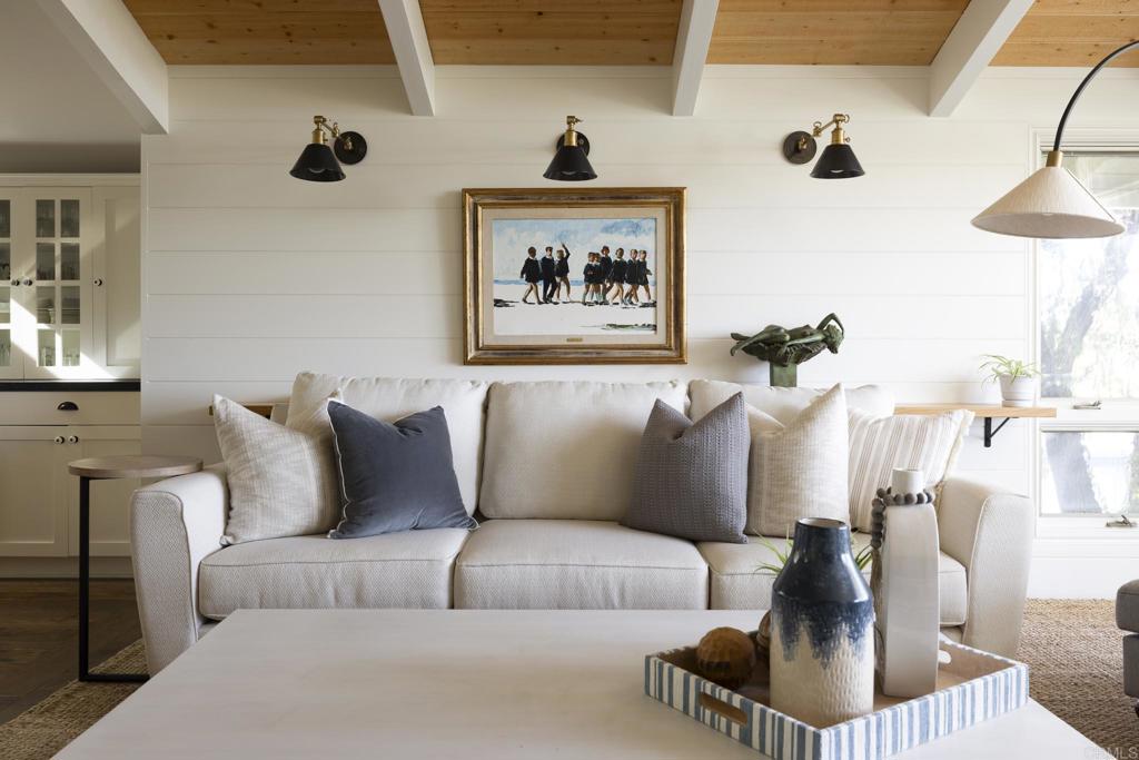 594 Rancho Santa Fe Road Encinitas, CA 92024 - Photo 16 of 47 a living room with furniture and a couch