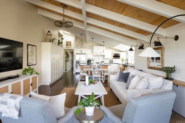 a balcony with furniture and outdoor view