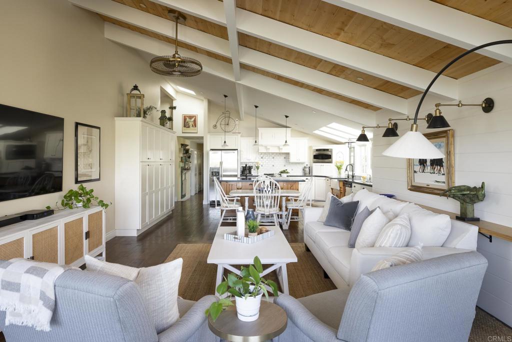 594 Rancho Santa Fe Road Encinitas, CA 92024 - Photo 18 of 47 a living room with furniture and a flat screen tv