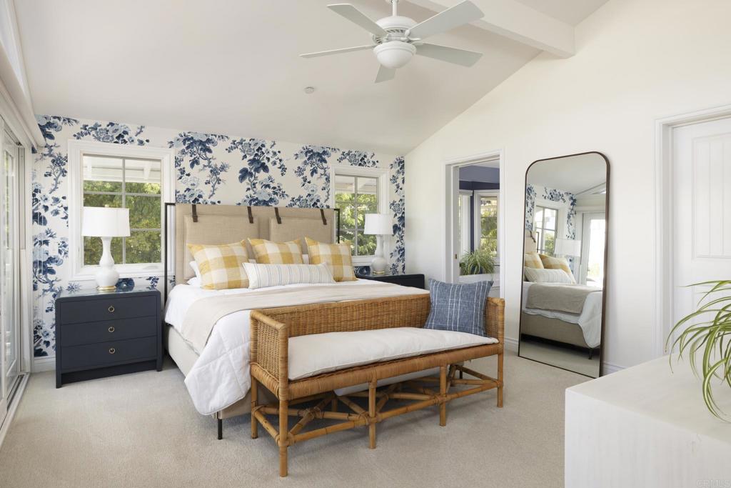 594 Rancho Santa Fe Road Encinitas, CA 92024 - Photo 22 of 47 a bedroom with a bed and a couch