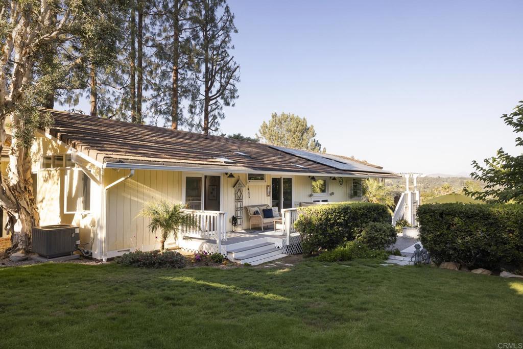594 Rancho Santa Fe Road Encinitas, CA 92024 - Photo 31 of 47 a front view of house with a garden