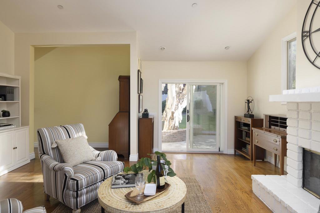 594 Rancho Santa Fe Road Encinitas, CA 92024 - Photo 33 of 47 a living room with furniture and a fireplace