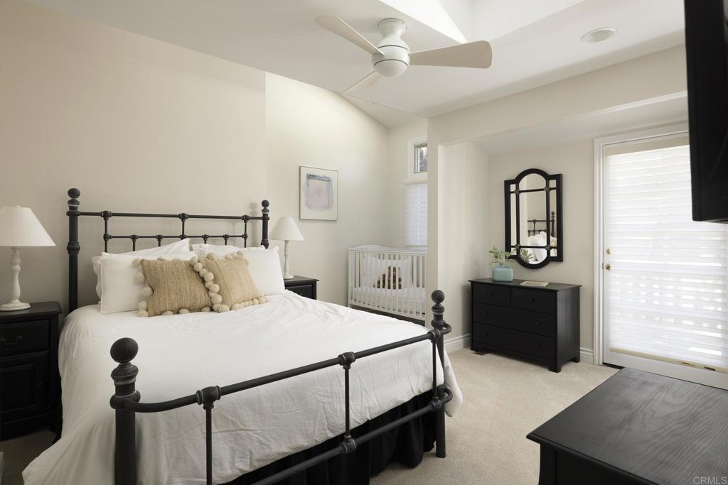 594 Rancho Santa Fe Road Encinitas, CA 92024 - Photo 35 of 47 a bedroom with a bed and a dresser