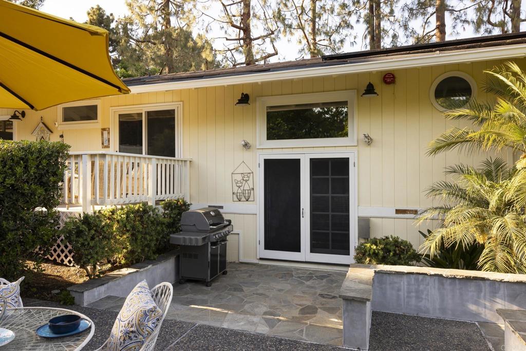 594 Rancho Santa Fe Road Encinitas, CA 92024 - Photo 38 of 47 a front view of a house with a yard