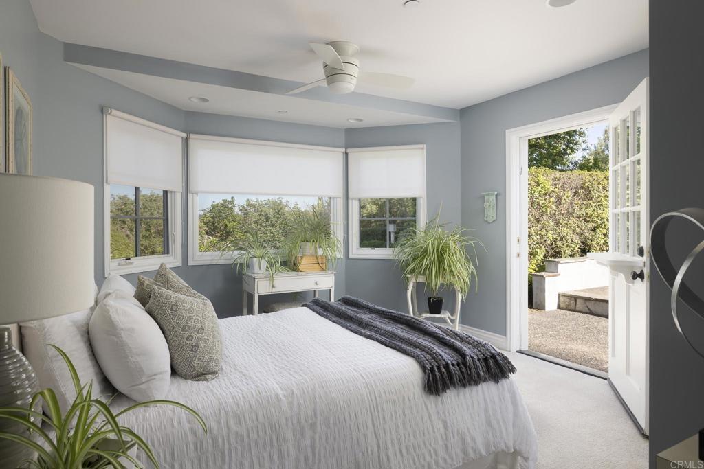594 Rancho Santa Fe Road Encinitas, CA 92024 - Photo 40 of 47 a bedroom with a bed and a large window