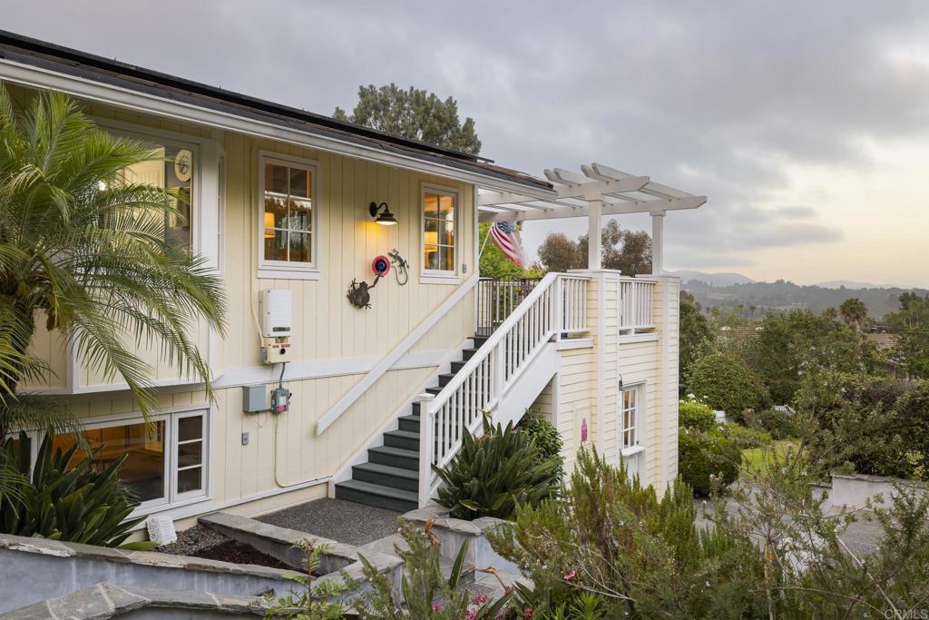 594 Rancho Santa Fe Road Encinitas, CA 92024 - Photo 9 of 47 a aerial view of a house with a yard