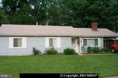 a aerial view of a house with a garden