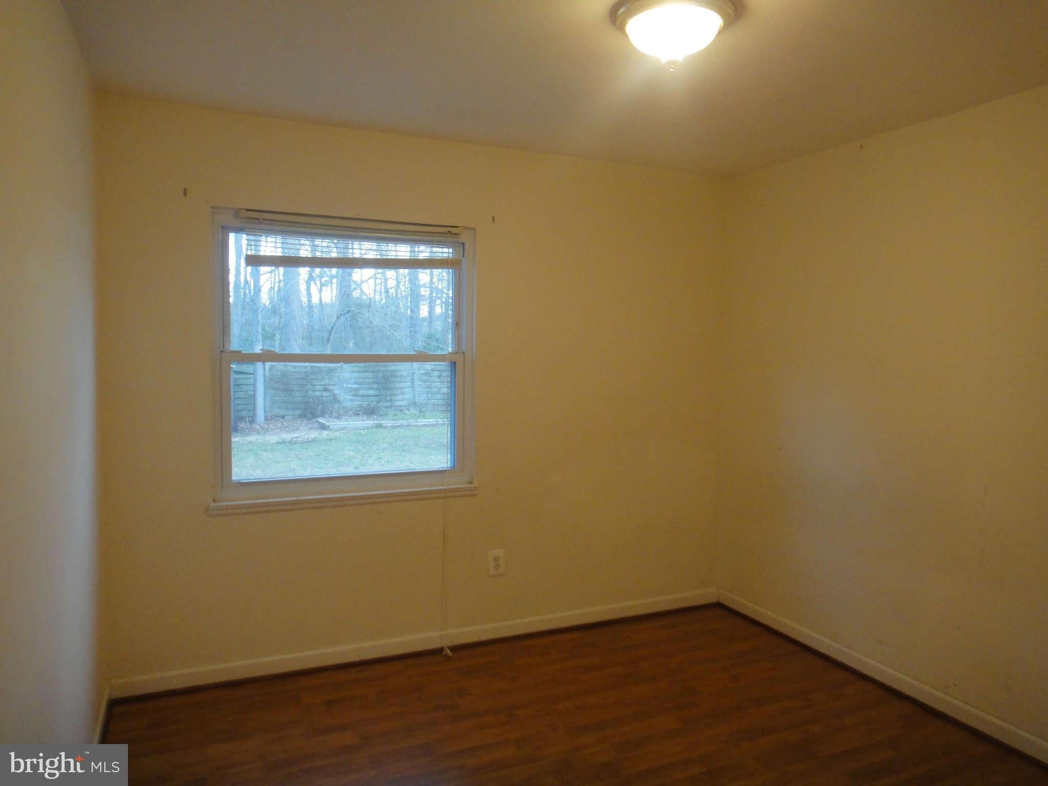 6221 Frontier Drive Springfield, VA 22150 - Photo 12 of 18 an empty room with a window